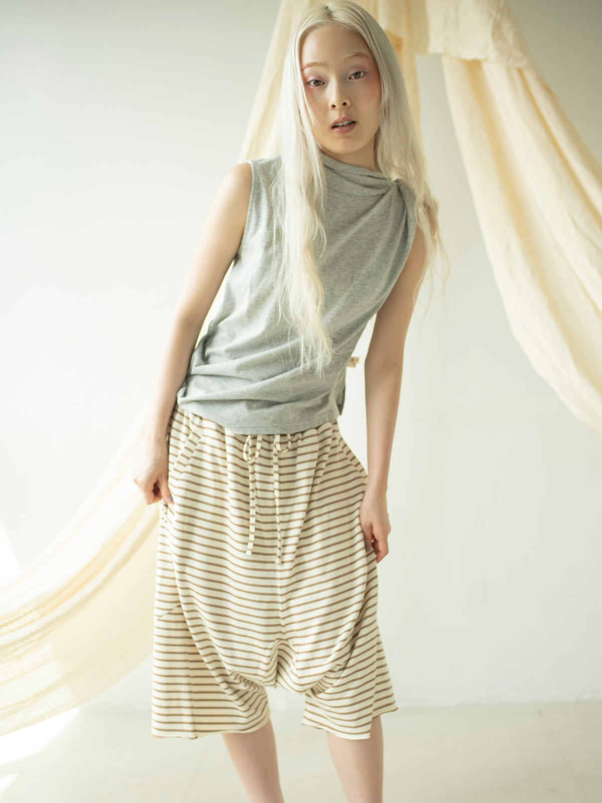 BORDER LOOSE HALF PANTS