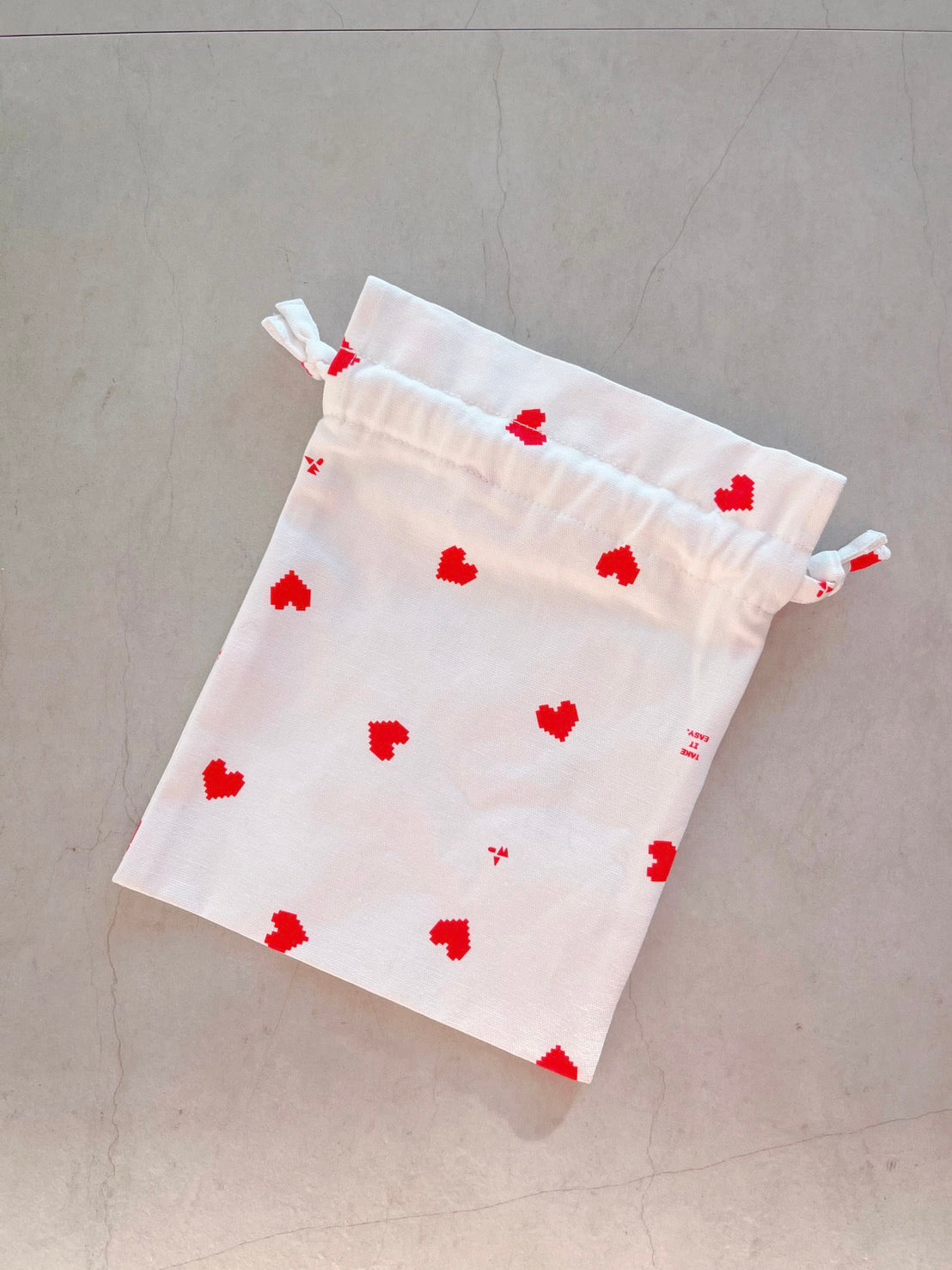 DAY BY DAY MINI POUCH