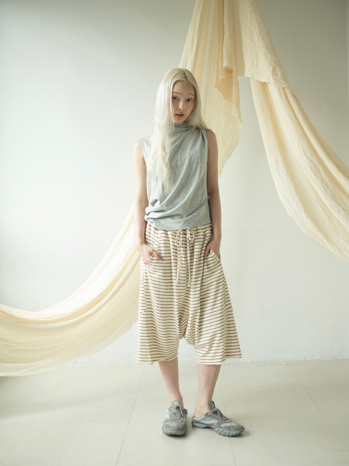 BORDER LOOSE HALF PANTS